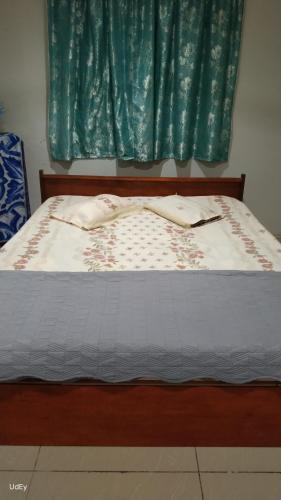 Llit o llits en una habitació de Inap Desa Morni