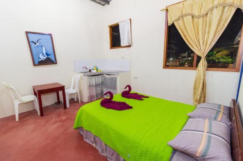 Cama o camas de una habitación en Mí Oficina