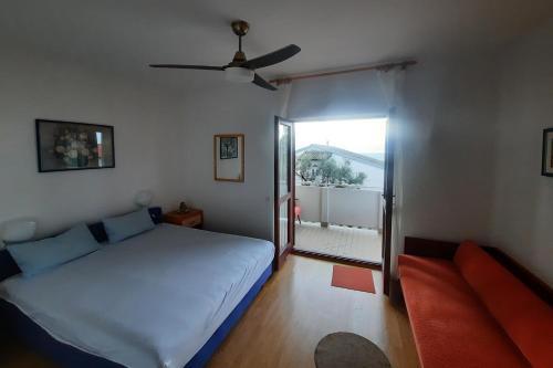 Posteľ alebo postele v izbe v ubytovaní Apartments by the sea Podaca, Makarska - 2621