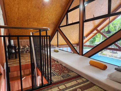 a view of a room with a large window at Homestay Umbai Kelana in Merlimau