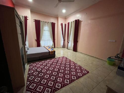 Fotografie z fotogalerie ubytování D'Rhu Homestay with 2 aircond v destinaci Bachok