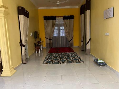 Fotografie z fotogalerie ubytování D'Rhu Homestay with 2 aircond v destinaci Bachok