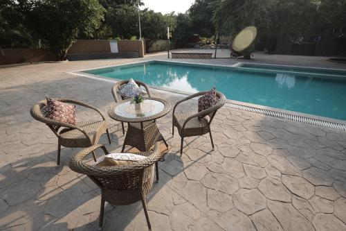 Bazén v ubytování EliteHotels and Resorts Pvt Ltd nebo v jeho okolí