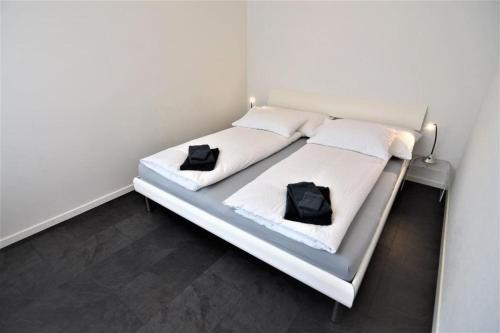 Postel nebo postele na pokoji v ubytování Holiday Apartment "Blüemlisalp"