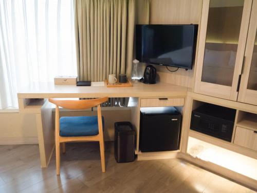 TV in/ali zabaviščno središče v nastanitvi Green Hotel - Tea Way