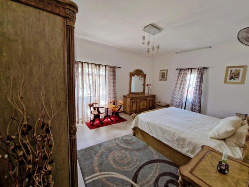 Postel nebo postele na pokoji v ubytování Nash Luxury Apartment with a Panoramic View