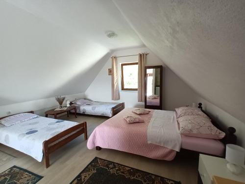 Posteľ alebo postele v izbe v ubytovaní Guesthouse Loncar