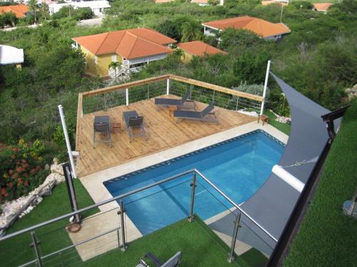 La alberca dentro o cerca de Group & Family House Galant Curaçao