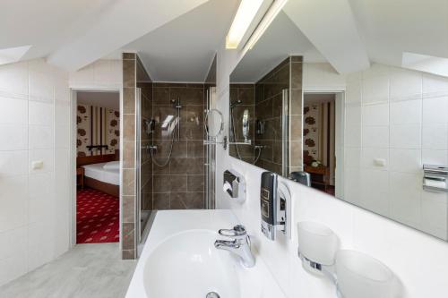 Koupelna v ubytování Hotel Berlin