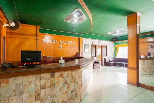 Televisyen dan/atau pusat hiburan di RedDoorz @ Jalan Jendral Sudirman Jambi 2