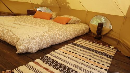 Postel nebo postele na pokoji v ubytování Sublim' Ecolodge