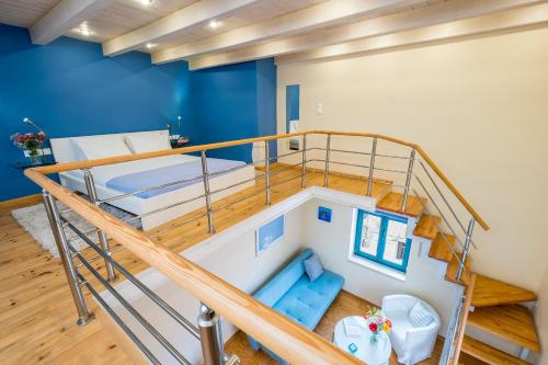 a room with a bunk bed and a staircase at Boutique Hotel Fortino in Chania