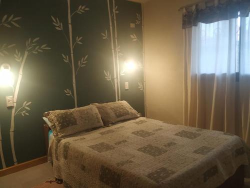 Postel nebo postele na pokoji v ubytování Cabaña Arroyo de los Patos