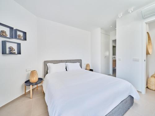 Postel nebo postele na pokoji v ubytování Colinas - Gazmira 0,3 DELUXE 1B