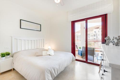 A bed or beds in a room at Balandros C105 Standard 2-Bedroom house