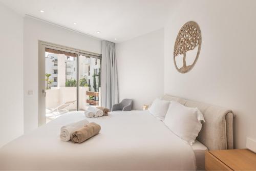 Ένα ή περισσότερα κρεβάτια σε δωμάτιο στο Colinas - Bentor 3,4 PENTHOUSE POOL VIEW & JACUZZI