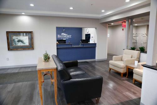 a waiting room at a dental office with a chair at Baymont by Wyndham Rockford in Rockford