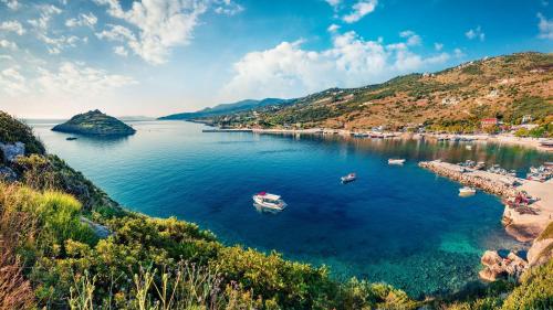 a group of boats in a large body of water at Spartia sea view Villa by "elite" in Volimes