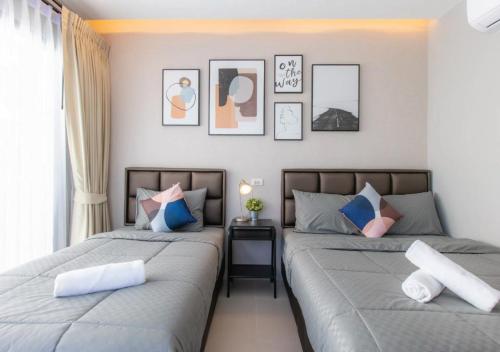 Postel nebo postele na pokoji v ubytování Boulogne Private Pool Villa Hua Hin Two