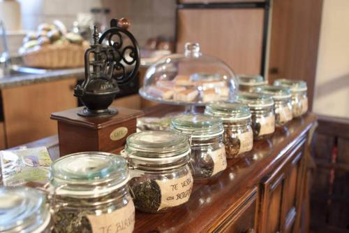 a counter with jars of food on a table at Ekolanda in Esnoz