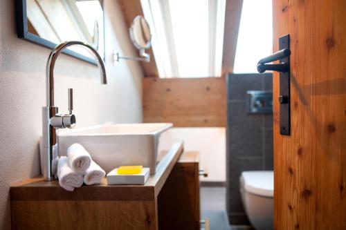 a bathroom with a sink and a toilet at Bergesgrün in Oberstdorf
