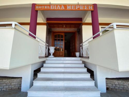 a stairway leading up to a hotel bilka mexico at Villa Meresi - Thassos Town Center in Limenas