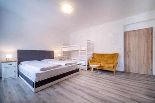 מיטה או מיטות בחדר ב-Apartment 123-2 Lipno Home