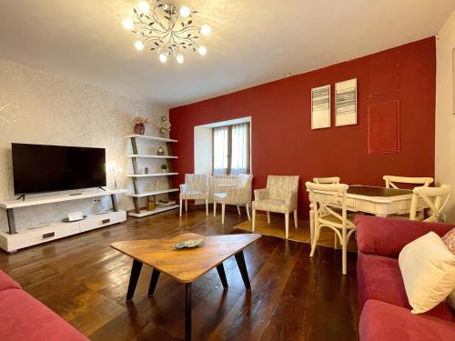 a living room with a couch and a table at CASA RURAL ERVITENA in Oteiza