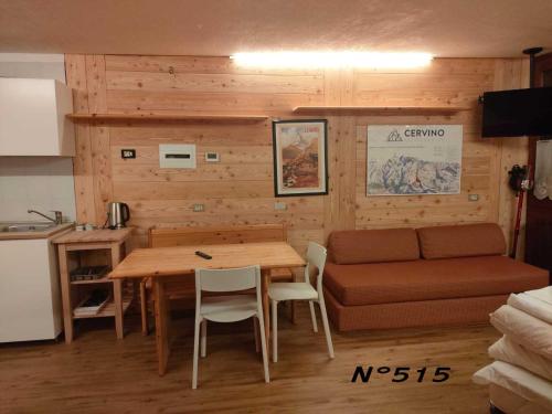 Kuchyň nebo kuchyňský kout v ubytování House Cervinia Apartments
