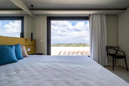 Giường trong phòng chung tại Villa vista mare Piscina e SPA