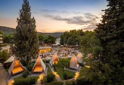 an overhead view of a park with tents and trees at PLACES Hvar Hotel by Valamar in Stari Grad