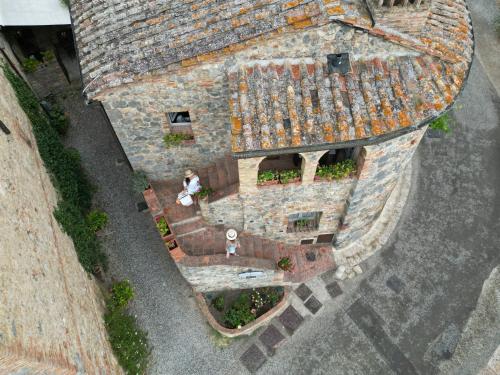 an overhead view of a building with a roof at Antica Dimora in San Gimignano