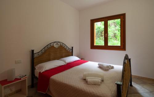 A bed or beds in a room at Residenze Il Girasole