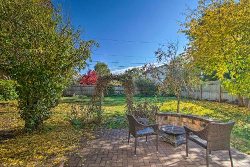 a patio with two chairs and a table in a yard at Front Royal Retreat about 1 Mi to National Park! in Front Royal