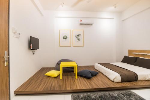 Ein Bett oder Betten in einem Zimmer der Unterkunft ALOR SETAR IMPERIO PROFESSIONAL SUITE by Zenith Smart