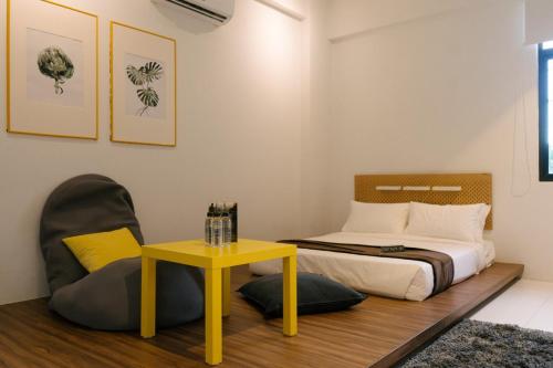 Ein Bett oder Betten in einem Zimmer der Unterkunft ALOR SETAR IMPERIO PROFESSIONAL SUITE by Zenith Smart