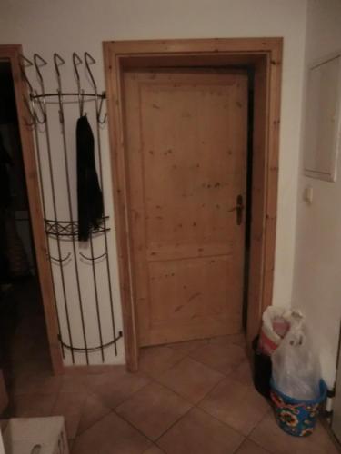 a room with a wooden door and a door at Urlaub am Inn in Wasserburg am Inn