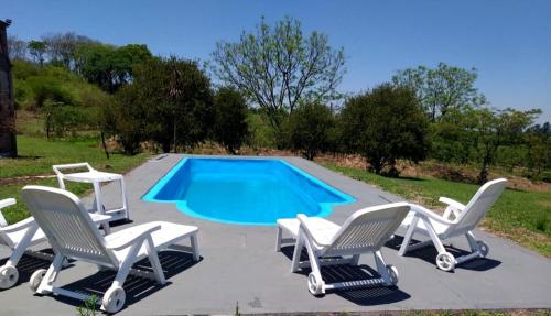 Бассейн в CASA QUINTA LA ENCANTADA или поблизости