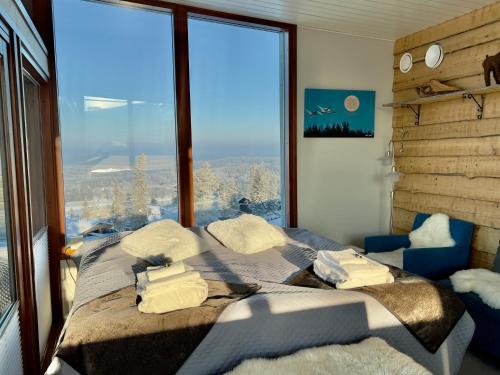 Кровать или кровати в номере Hotel Arctic Zone