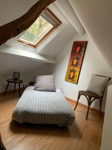 Katil atau katil-katil dalam bilik di LES TERRASSES (centre de Pierrefonds)