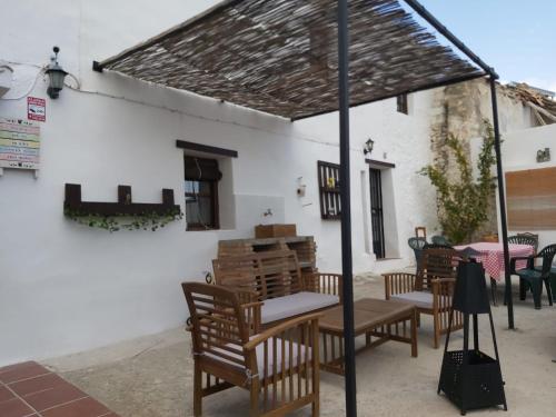 Fotografia z galérie ubytovania CASA RURAL EN GRANADA CON CHIMENEA, PISCINA PRIVADA Y BARBACOA LA CASITA DE TóZAR v destinácii Tózar