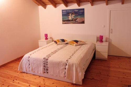 Ένα ή περισσότερα κρεβάτια σε δωμάτιο στο MyHome