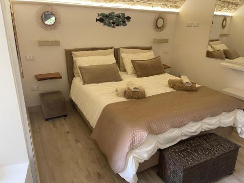 Letto o letti in una camera di Monolocale Dimora Borgo Monte nel cuore di Otranto con garage