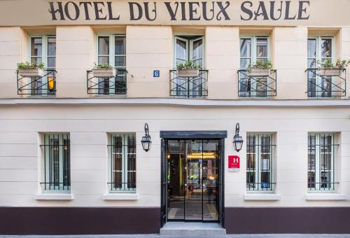 a building with a hotel dmg vegas sale at Hôtel Du Vieux Saule in Paris