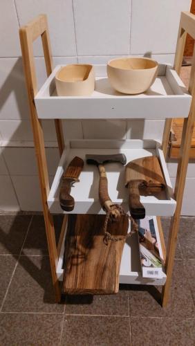 a white shelf with two bowls on top of it at Vikendica Zajecar 