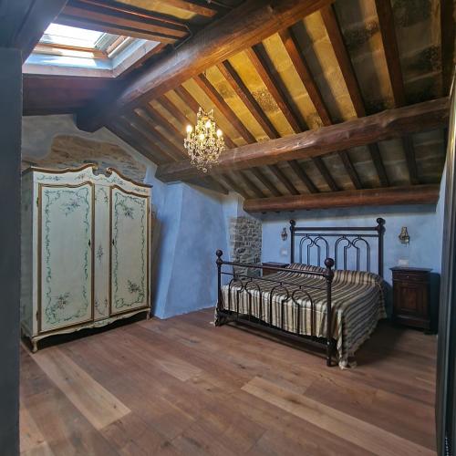 Postel nebo postele na pokoji v ubytování Il Cantuccio - Borgo con piscina privata