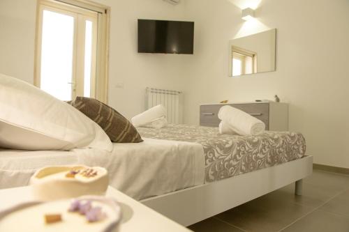 Ένα ή περισσότερα κρεβάτια σε δωμάτιο στο Joyce Luxury Suite