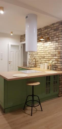 Kuchyň nebo kuchyňský kout v ubytování Apartament The Space 2