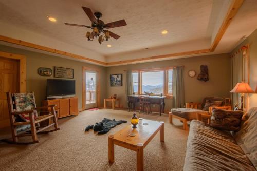 a living room with a couch and a table at Fox Crossing in Banner Elk