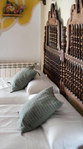 Postel nebo postele na pokoji v ubytování Casa Rural Andrea